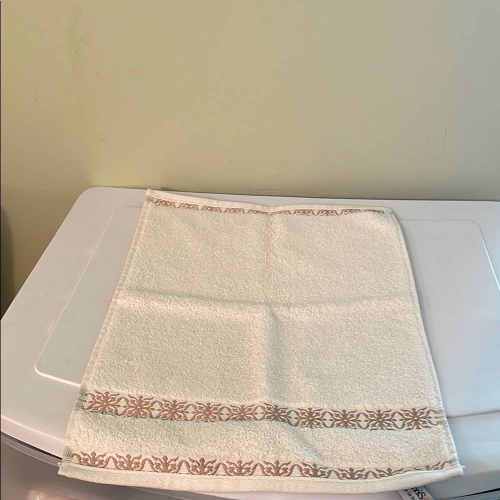 Elegant Cream Hand  Towel with Tan Design